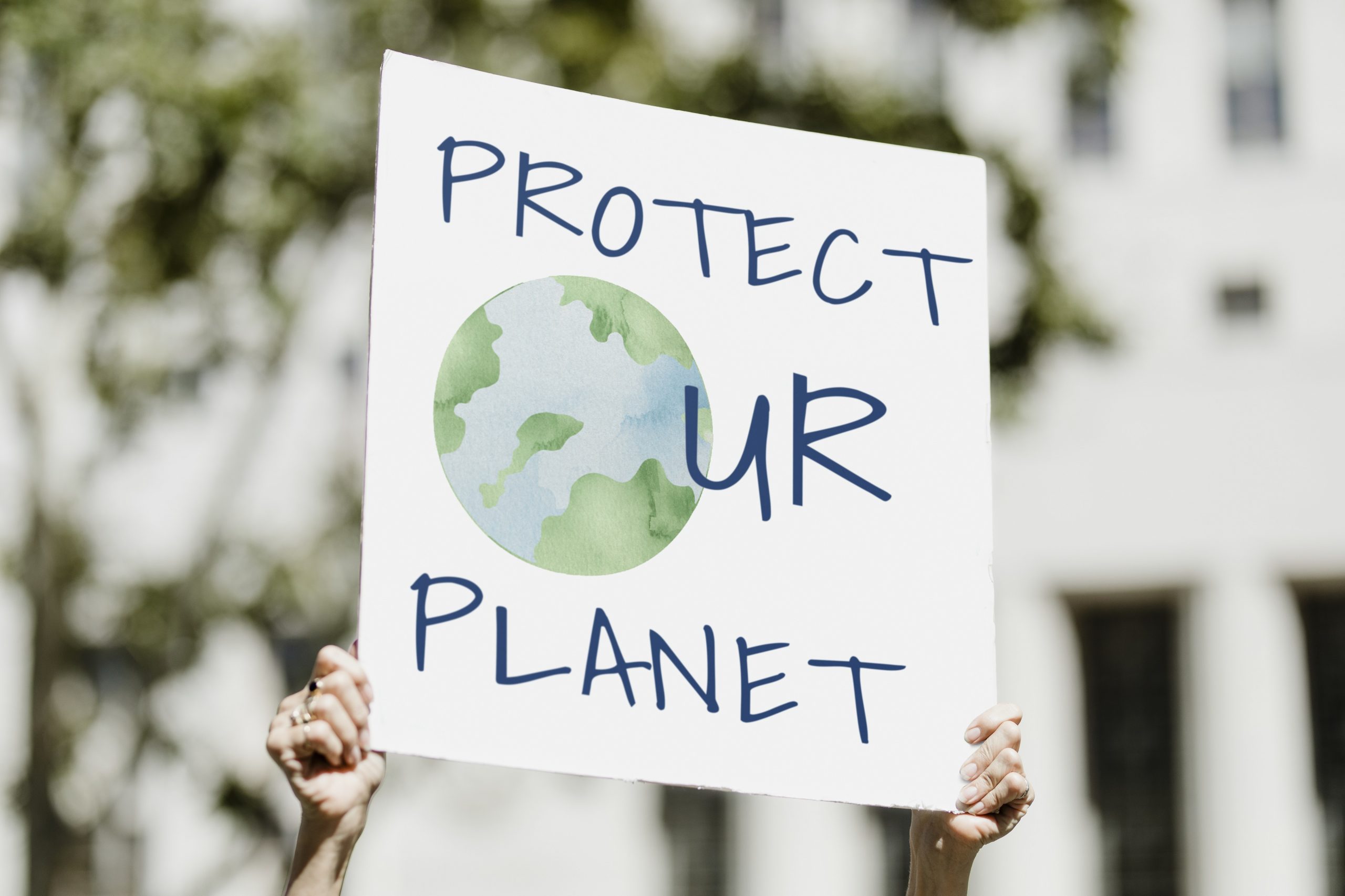 protect-your-planet-environmentalist-protesting-against-global-warming-scaled